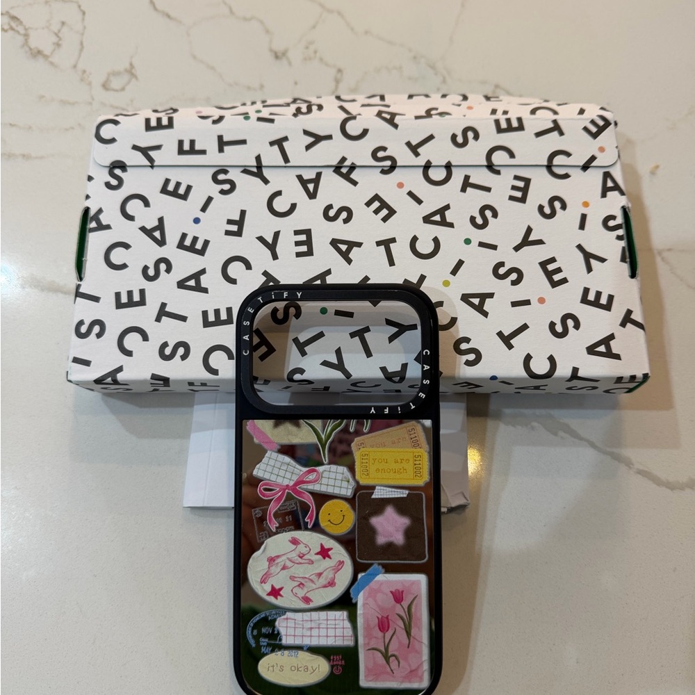 Casetify Black Phone Case with Colorful Graphic Design
